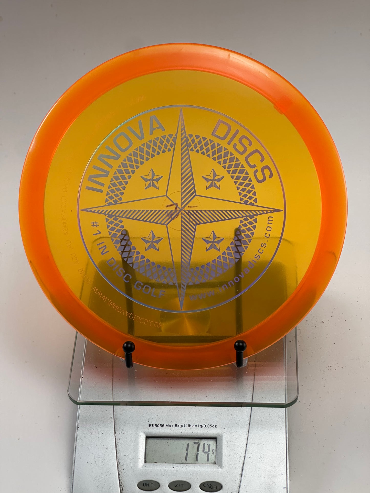 Innova Champion Leopard3 – Transparent Yellow w/ Orange Rim, Silver Star Stamp