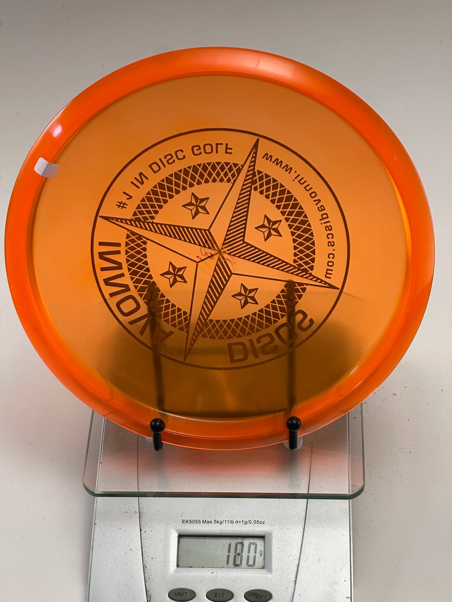 Innova Champion Mako3 – Translucent Orange Compass Star Stamp (180g)