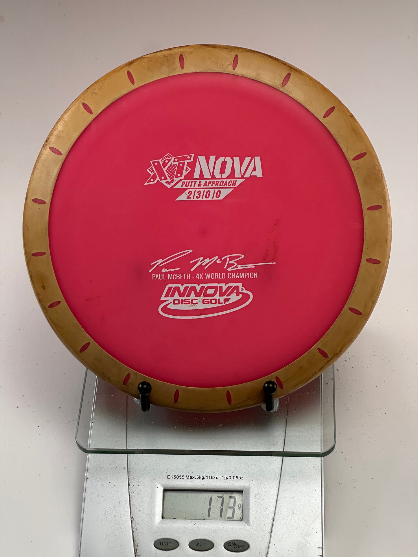 Innova XT Nova (Pink w/ Tan Overmold) Paul McBeth Compass Stamp