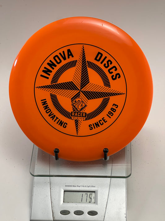 Innova DX Racer Disc Golf Disc - Orange w/ Black Compass Stamp