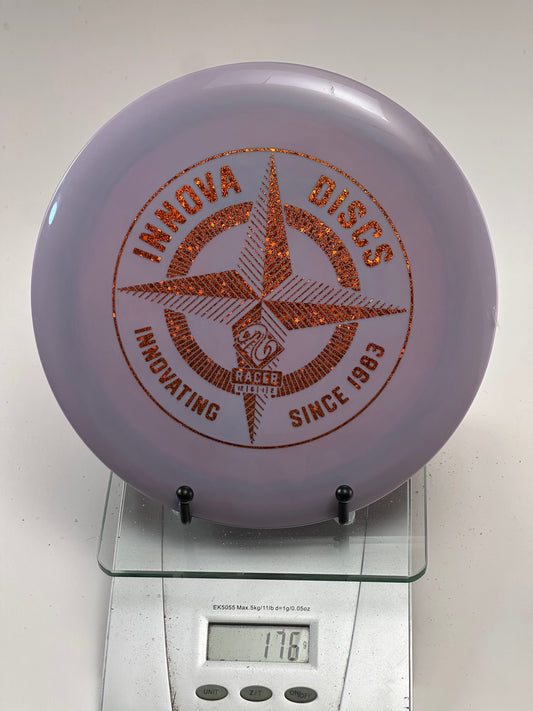 Innova Champion Racer – Lavender with Red Sparkle Compass Stamp (176g)