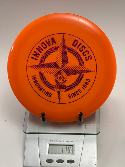 Innova DX Racer Disc Golf Disc - Orange with Black Compass Stamp