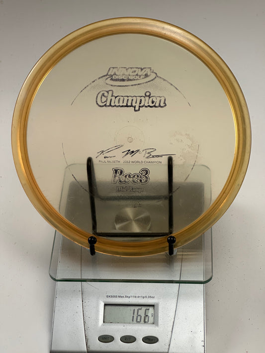 Innova Champion Roc3 Clear/Gold Rim Paul McBeth 2012 World Champion Stamp