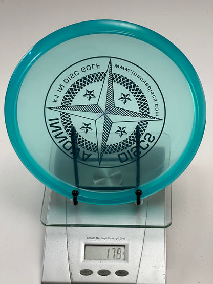 Innova Champion Roc VRoc Midrange – Transparent Aqua Blue Compass Stamp 180g
