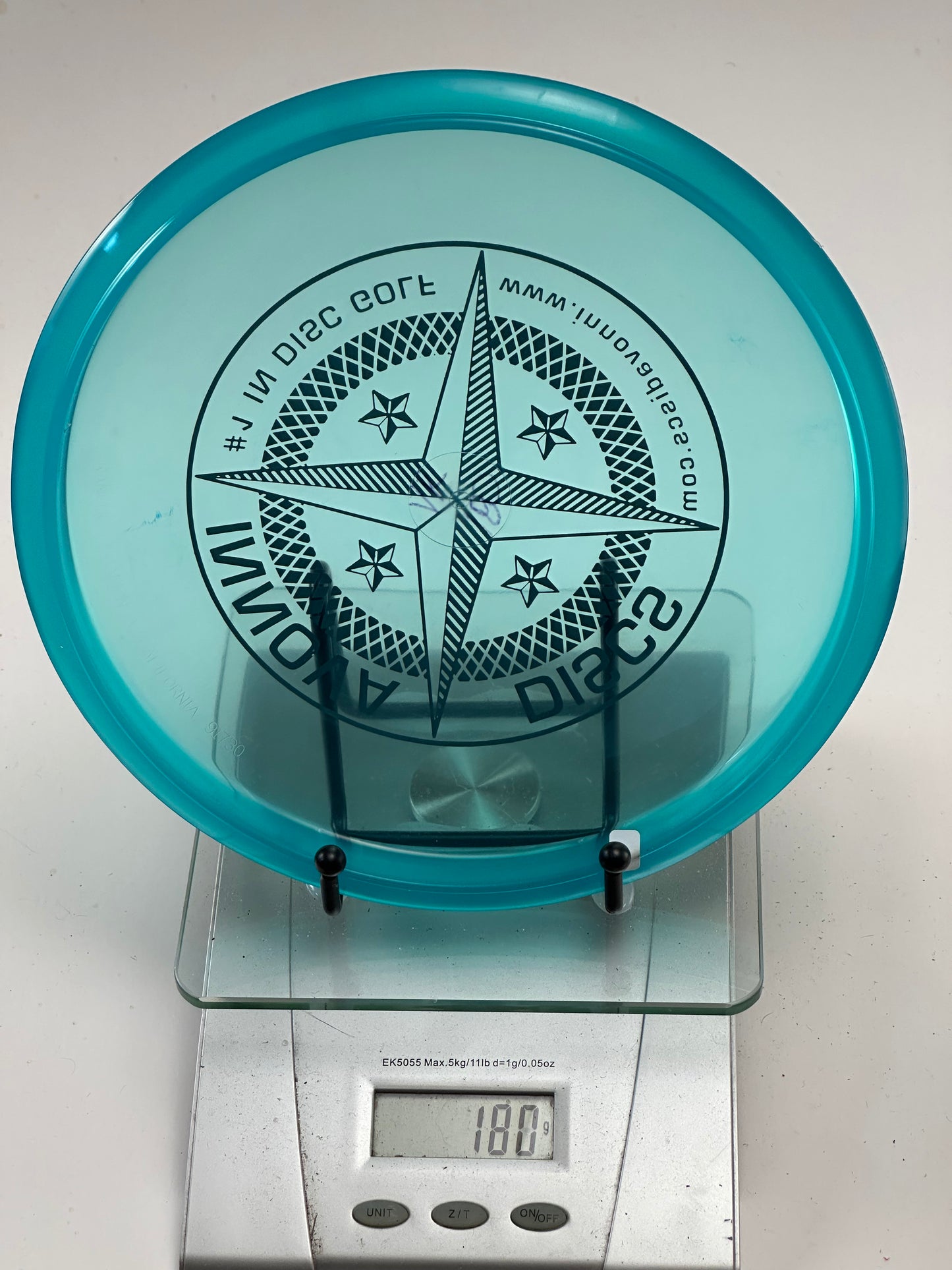 Innova Champion Roc VRoc – Translucent Aqua Blue Compass Stamp