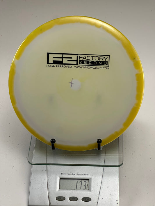 Innova Star F2 Savant – Swirly Yellow Rim, Cloudy Center (173g)