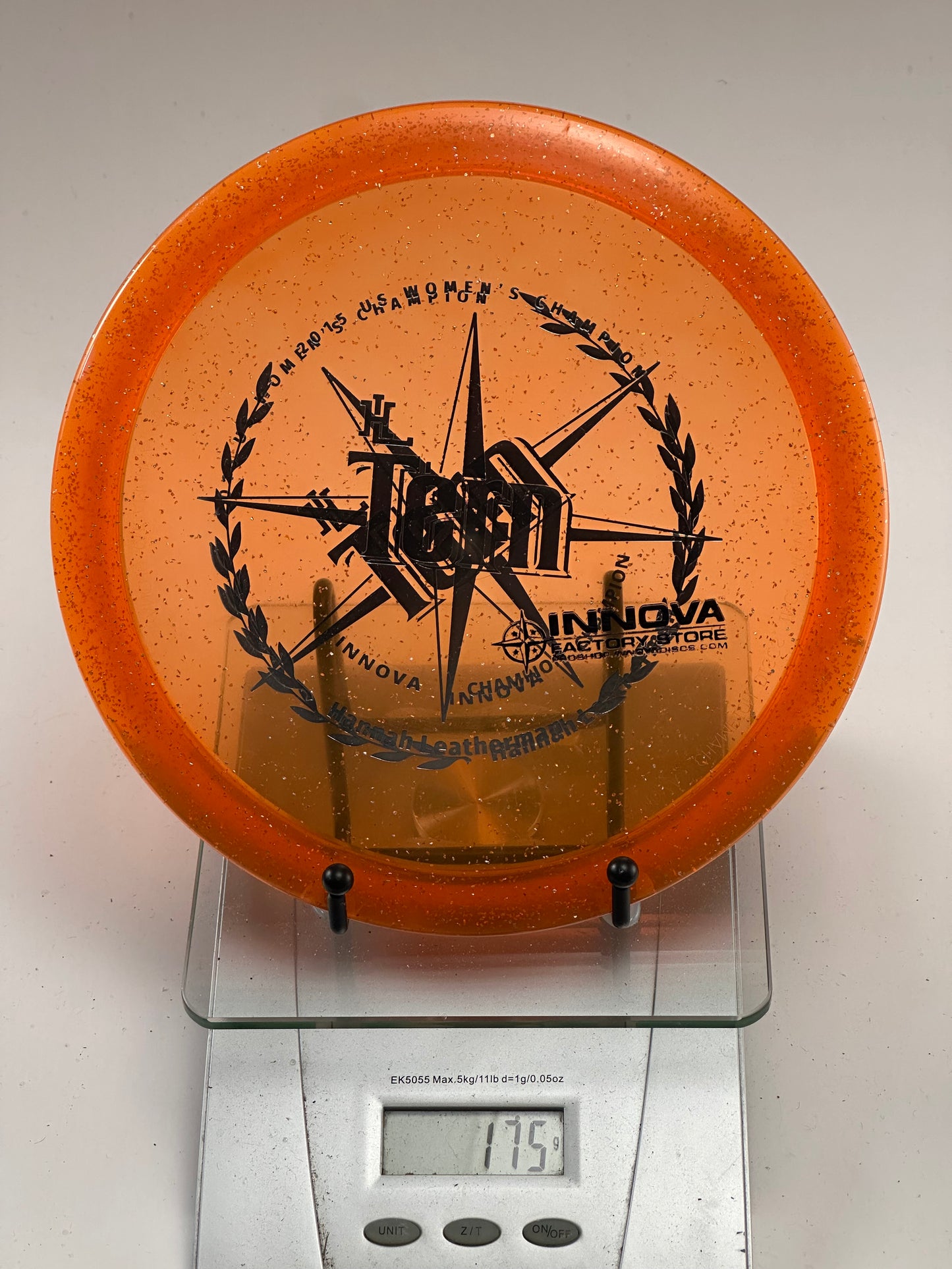 Innova Teebird3 Metal Flake Champion – Transparent Orange (Tournament Stamp)