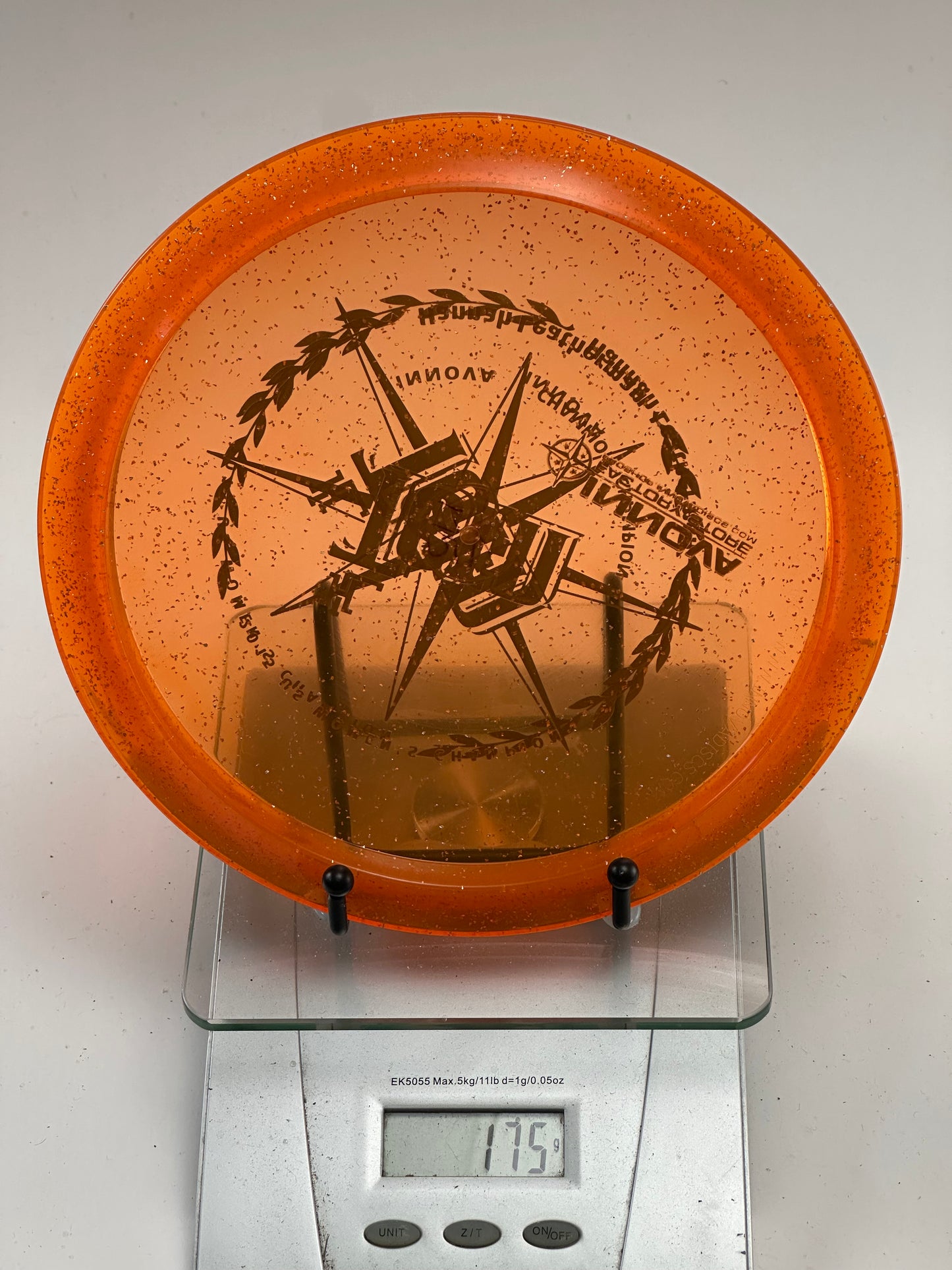 Innova Teebird3 Metal Flake Champion – Transparent Orange (Tournament Stamp)