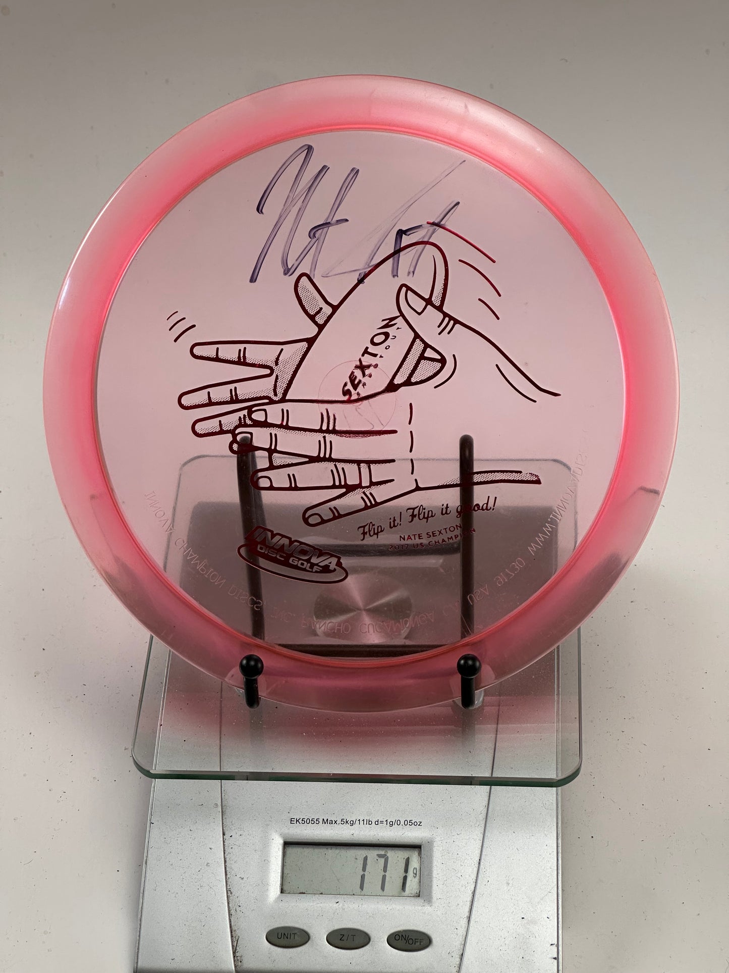 Innova Champion Teebird – Nate Sexton Signature Hand Stamp, Clear Pink