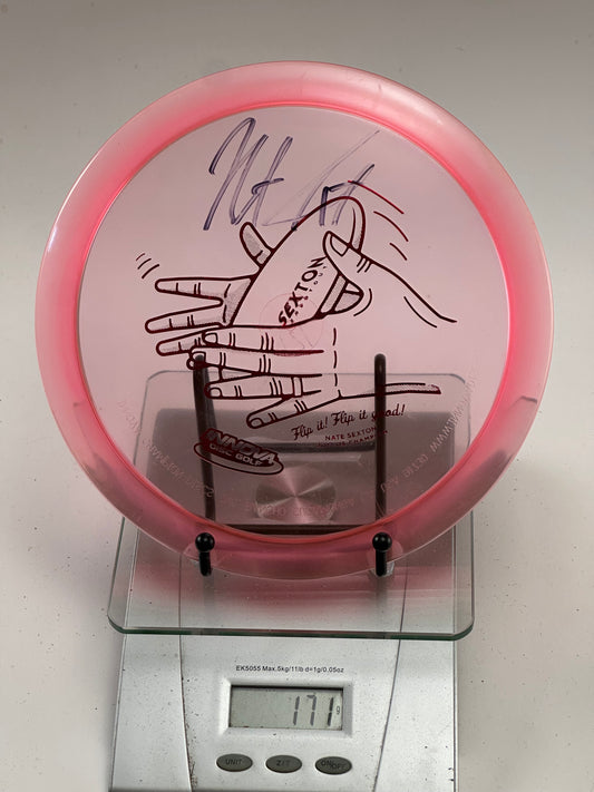 Innova Champion Teebird – Nate Sexton Signature Hand Stamp, Clear Pink