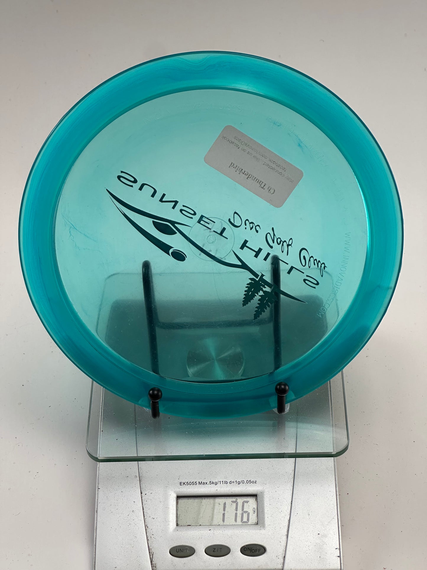 Innova Champion Thunderbird – Transparent Blue Sunset Hills Disc Golf Club Stamp