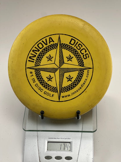 Innova DX Whale Putter – Yellow w/ Black Compass Stamp