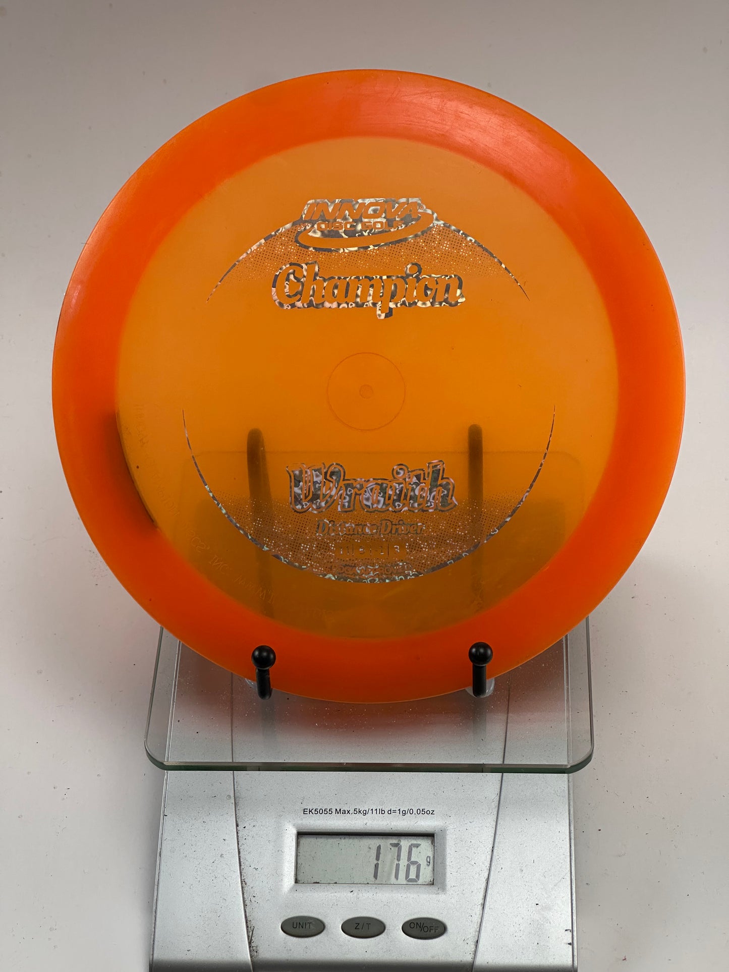 Innova Champion Wraith Distance Driver – Transparent Orange w/ Silver Stamp