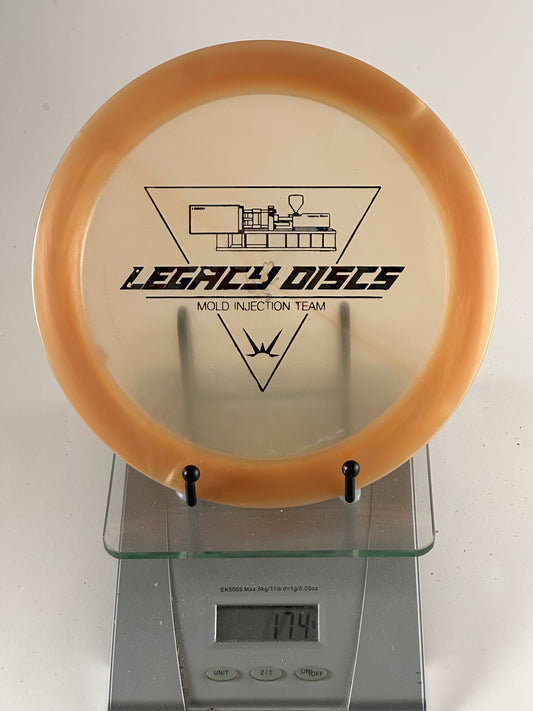 Legacy Mold Injection Team Distance Driver - Translucent Orange 174g