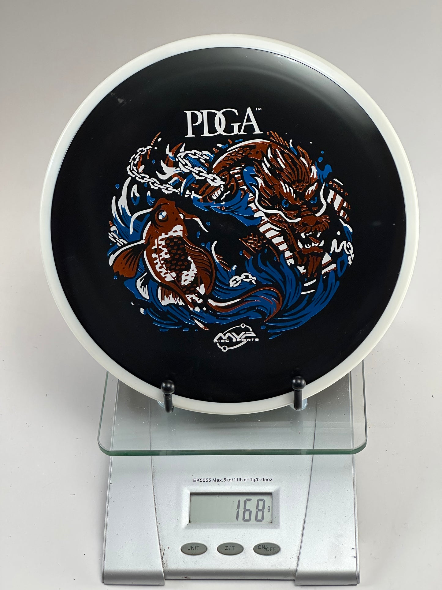 MVP Fission Crave Fairway Driver | Black w/ White Rim | PDGA Dragon & Koi Stamp
