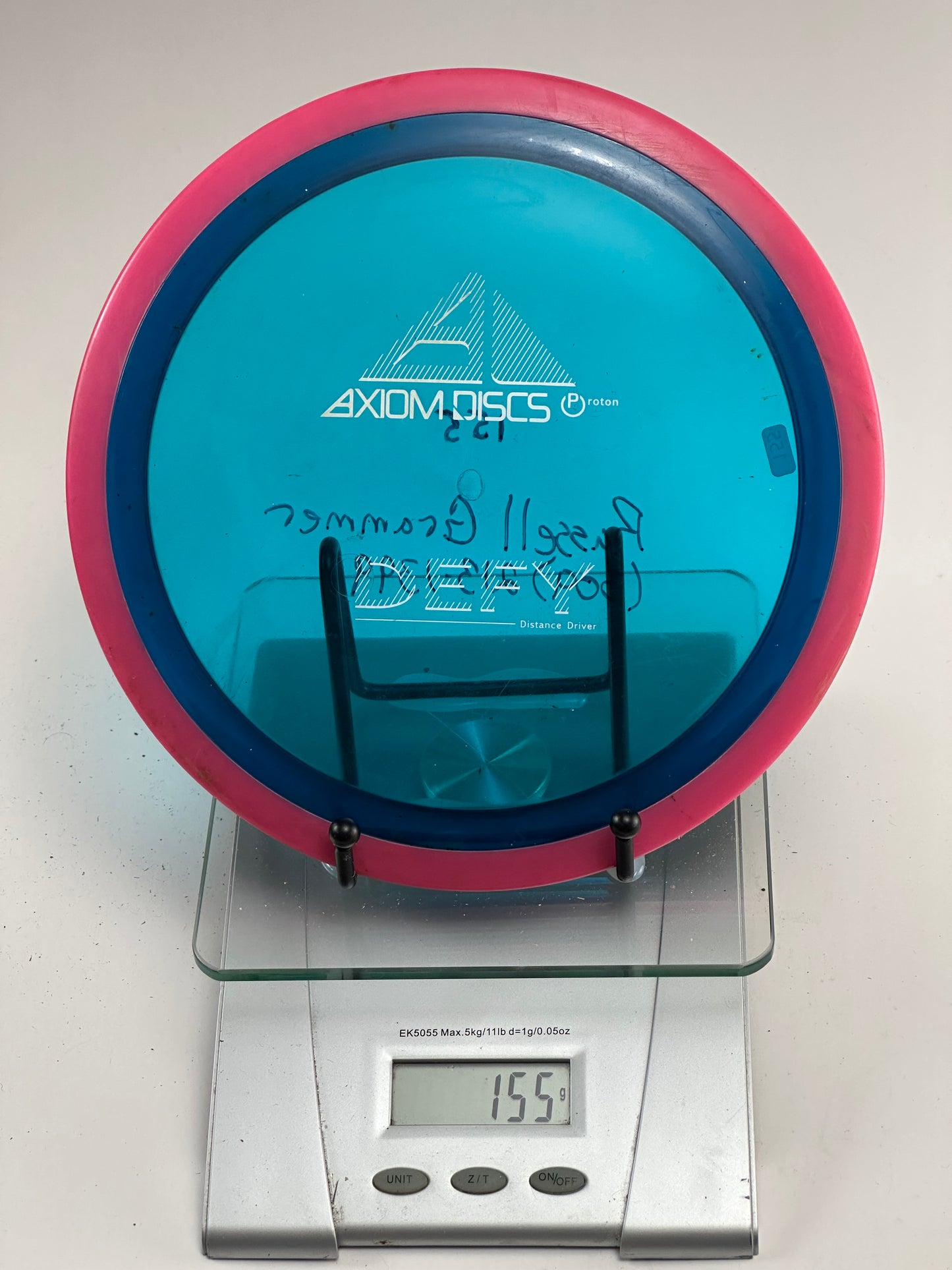Axiom Defy Proton Distance Driver 155g Blue with Pink Rim