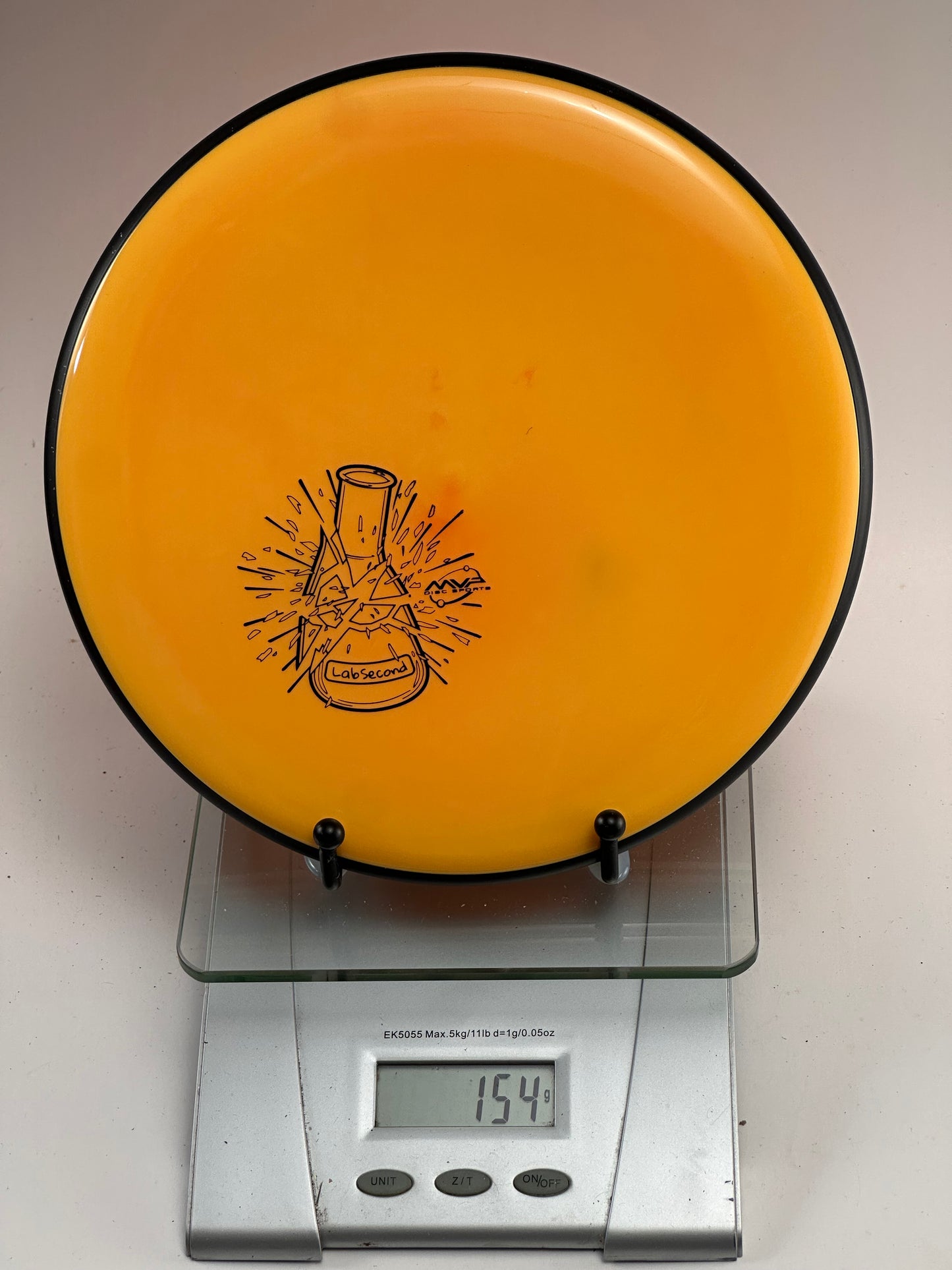 MVP Glitch R2 Neutron (Lab Second) – Orange w/ Black Rim, 154g