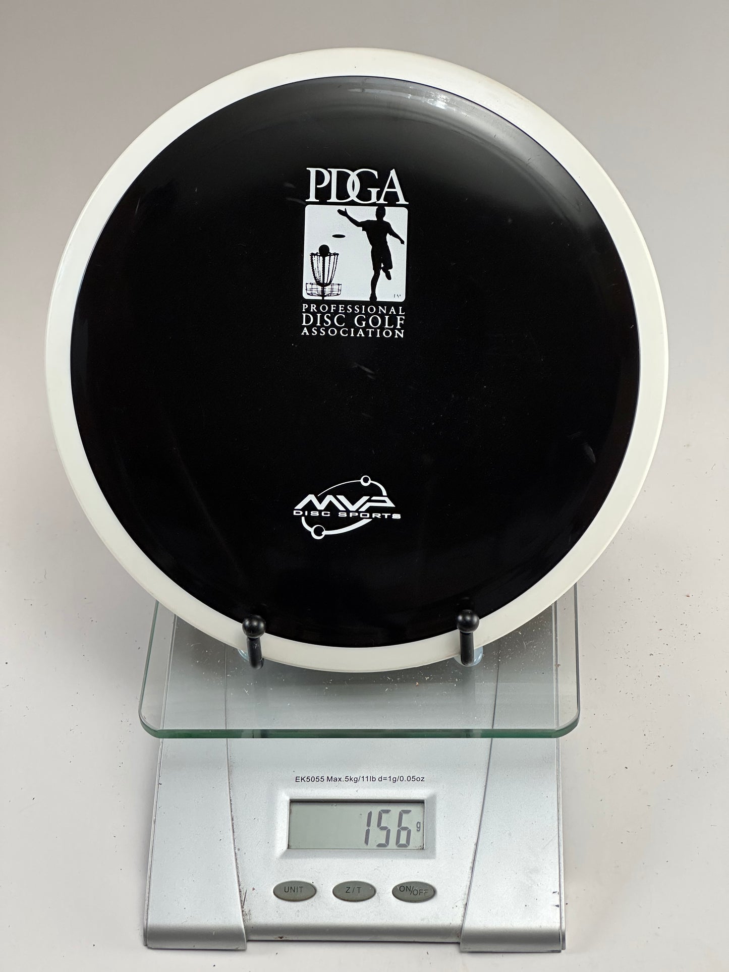 MVP Inertia (Electron) Distance Driver – Black w/ White Rim, PDGA Stamp, 156g