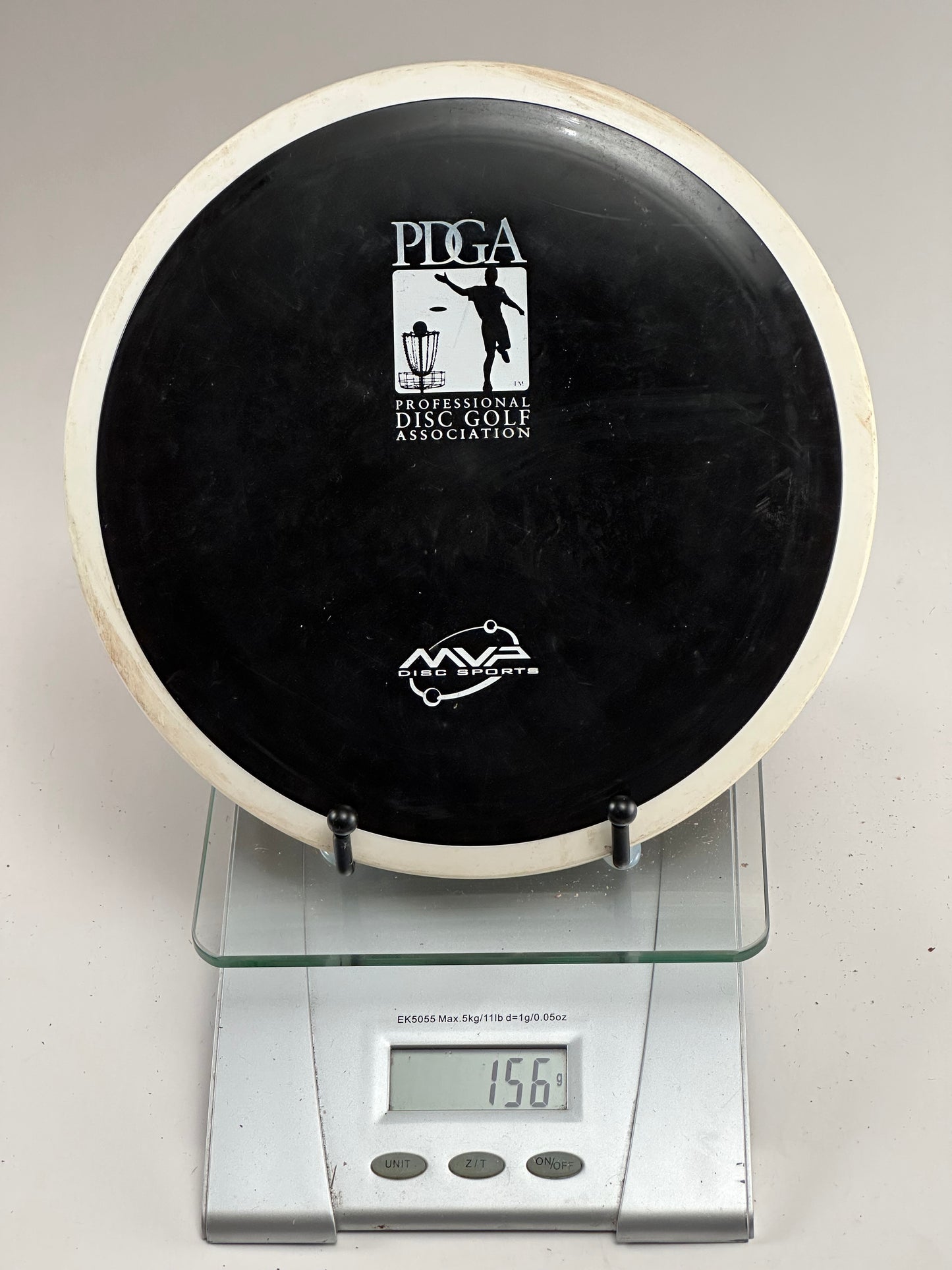 MVP Inertia | Electron | Black w/ White Rim | PDGA Stamp