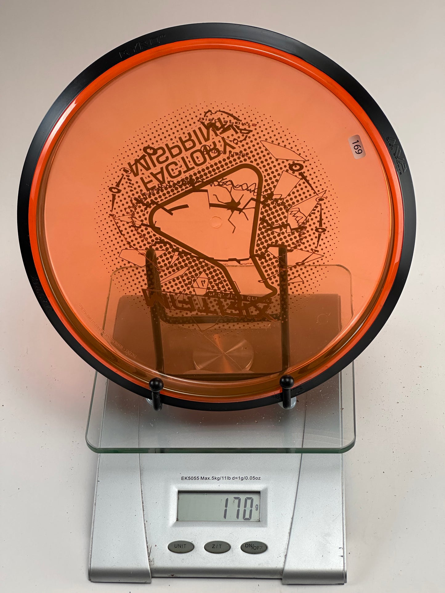 MVP Proton Matrix Midrange (170g) - Transparent Orange w/ Black Rim