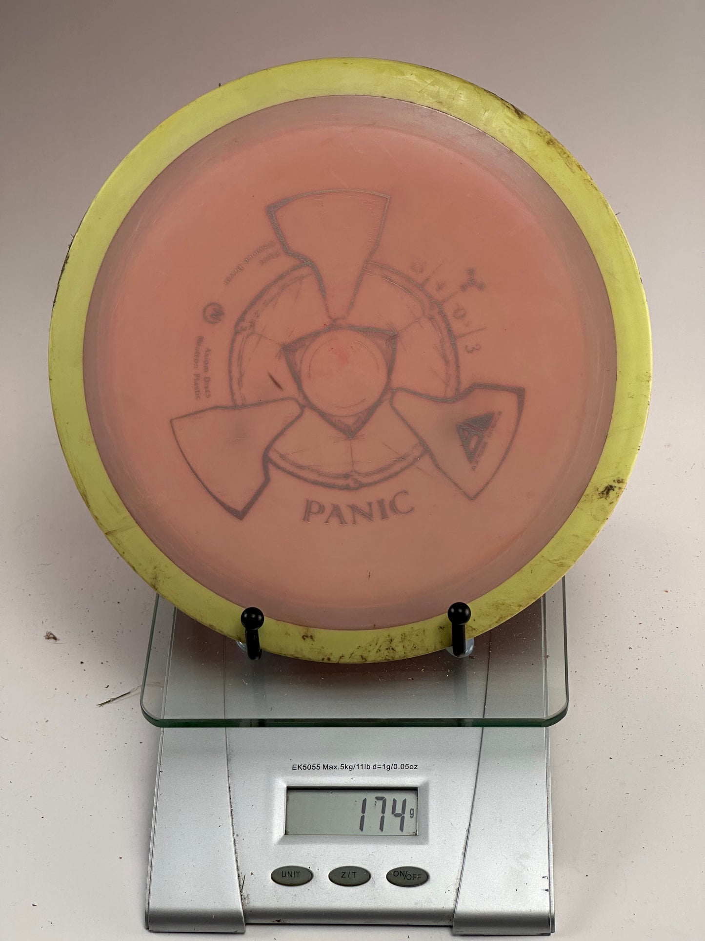 MVP Proton Panic Disc Golf Disc | Pink Transparent Plate, Yellow Rim