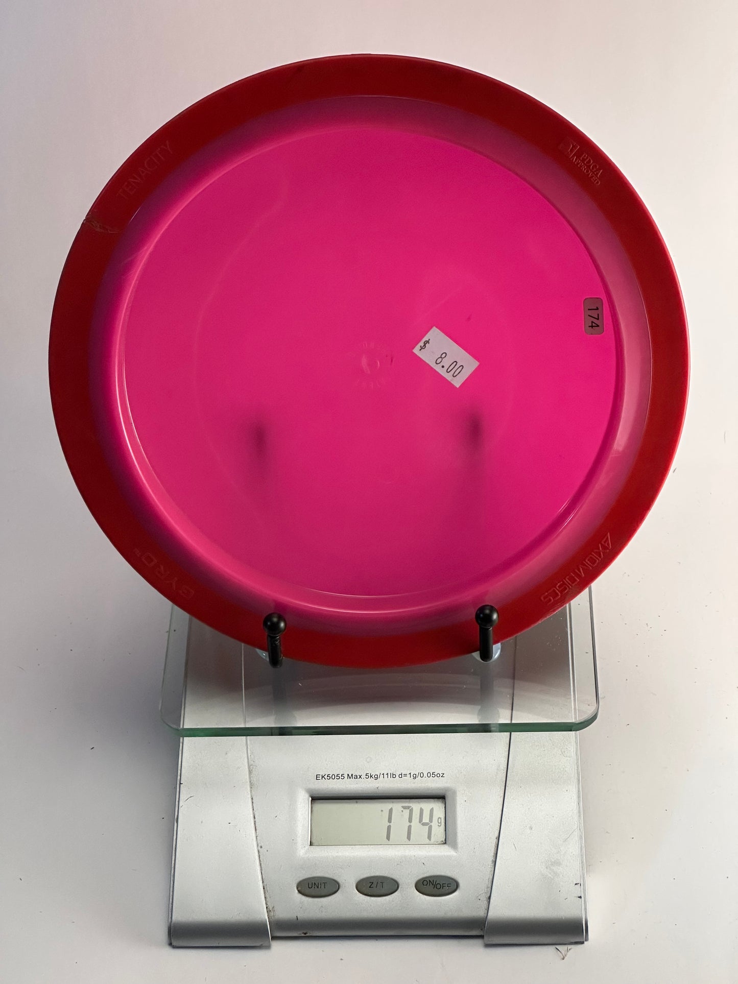 Axiom Tenacity Neutron Distance Driver (Pink w/ Red Rim) 174g