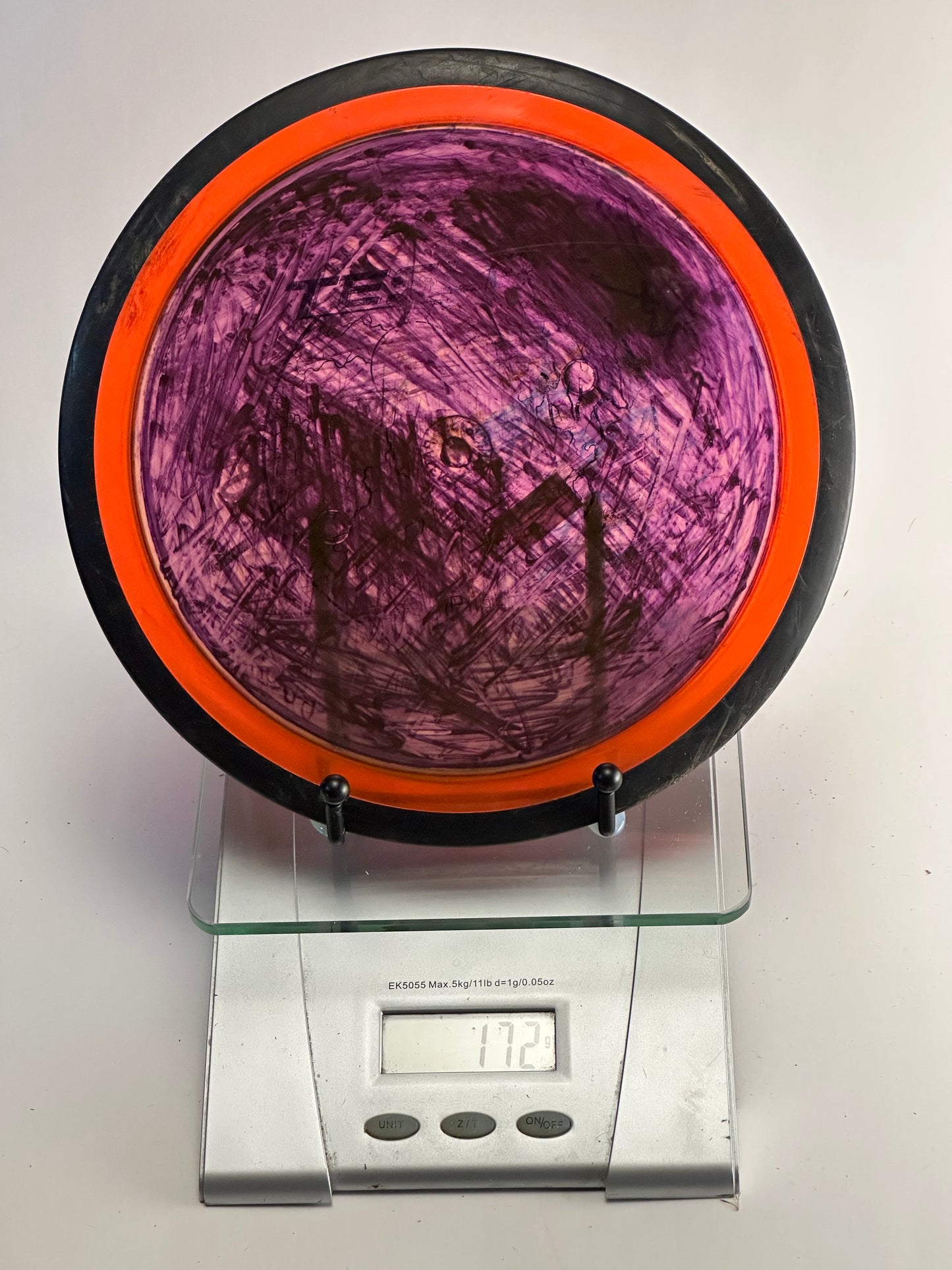 MVP Neutron Tesla Distance Driver (Purple Dye, Orange Rim)