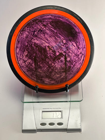 MVP Neutron Tesla Distance Driver (Purple Dye, Orange Rim)