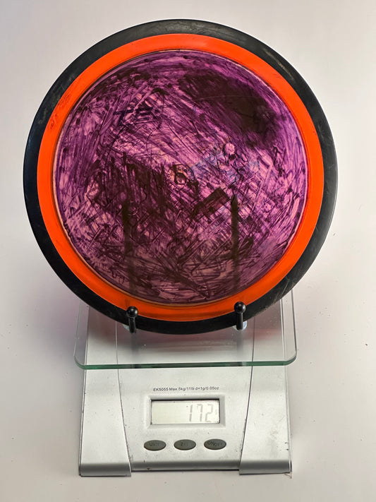 MVP Neutron Tesla Distance Driver (Purple Dye, Orange Rim)