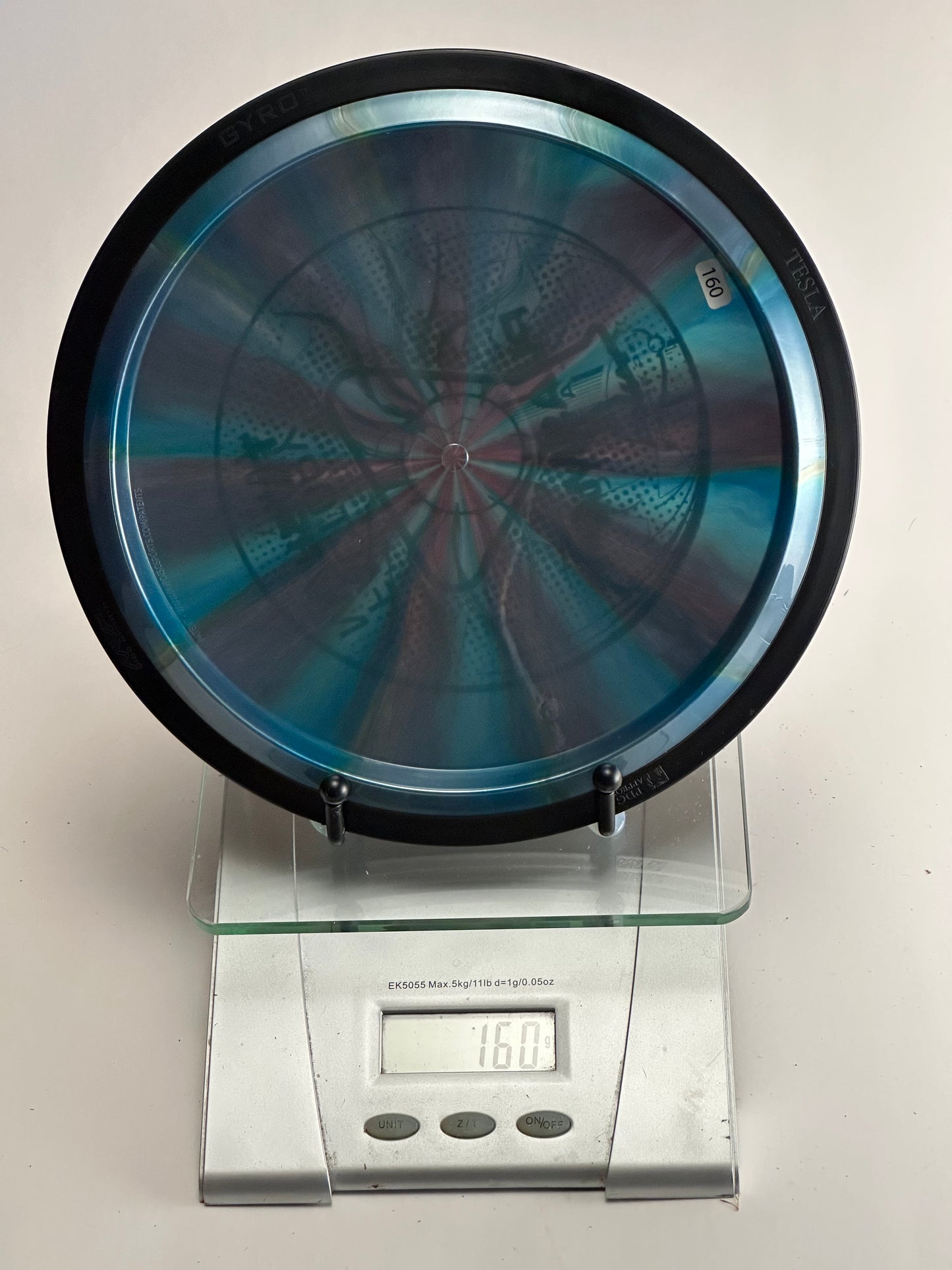 MVP Plasma Tesla Distance Driver – Blue Swirl, Black Rim (160g)