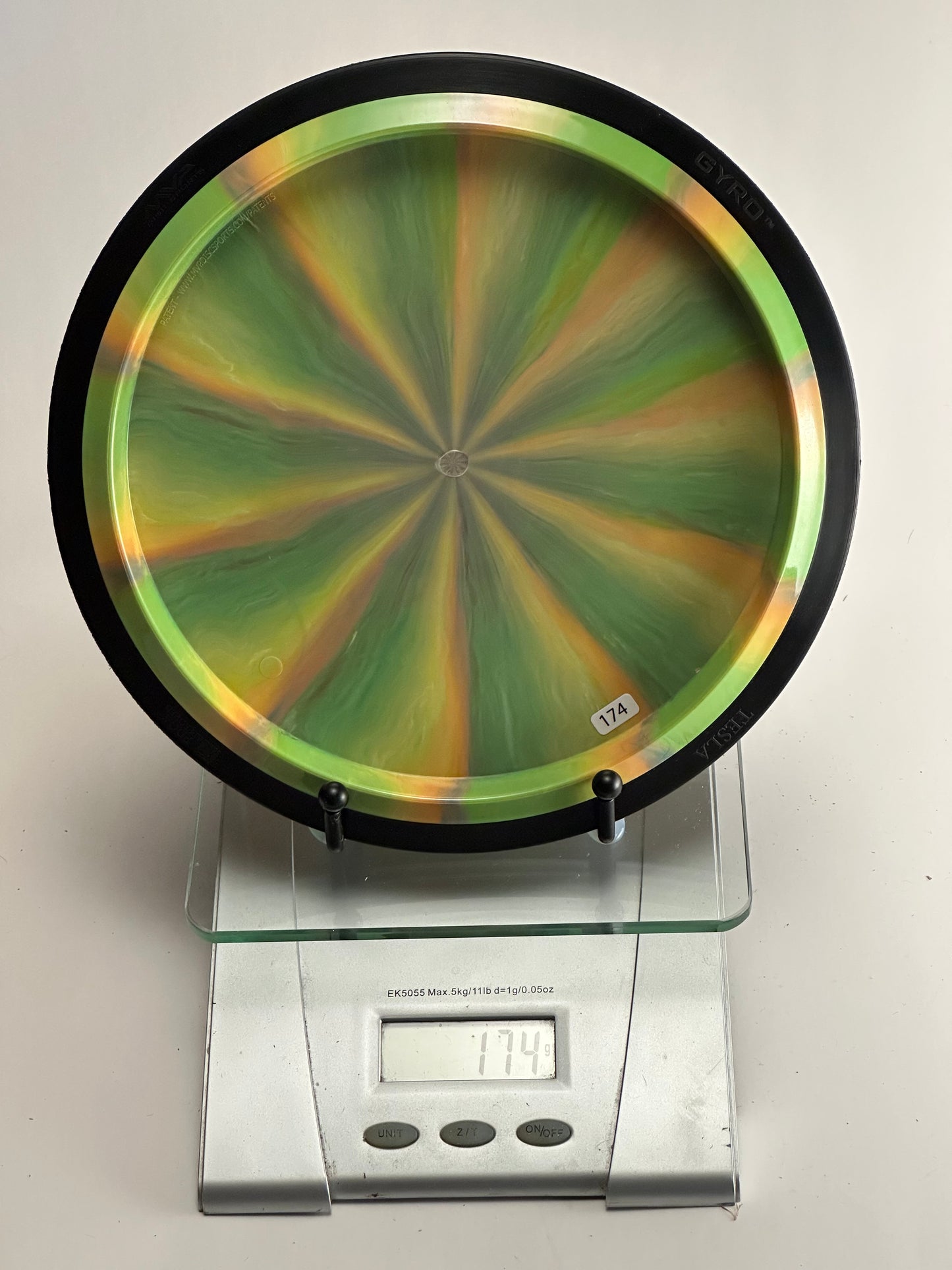 MVP Plasma Tesla Lab Second Distance Driver (Green/Orange Swirl, 174g)