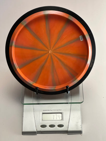 MVP Plasma Tesla Distance Driver 174g - Orange/Gray Swirl, Black Rim, Grim Reaper