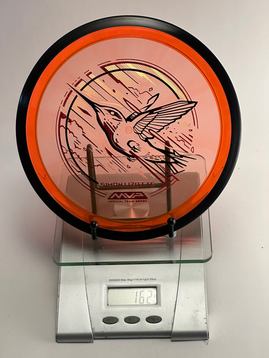 MVP Plasma Tesla (Simon Lizotte Team Series) Transparent Orange/Black Rim 163g