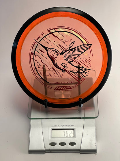 MVP Plasma Tesla Simon Lizotte Team Series (Hummingbird) 162g Orange Clear/Black Rim
