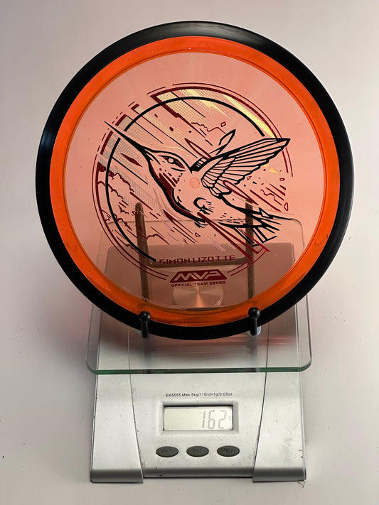 MVP Plasma Tesla Simon Lizotte Team Series (Hummingbird) 162g Orange Clear/Black Rim