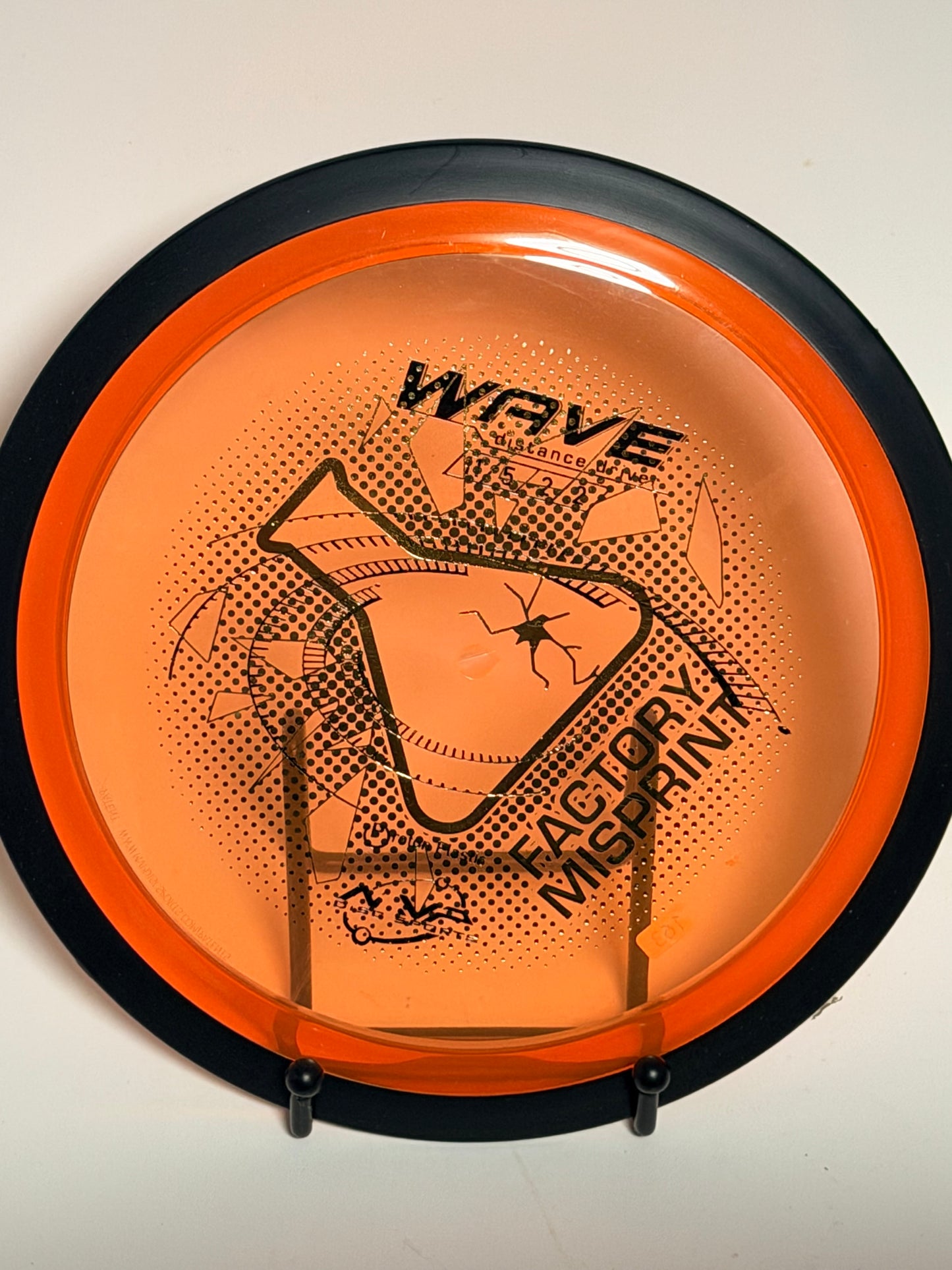 MVP Neutron Wave Factory Misprint – Orange/Black Rim, Holographic Stamp