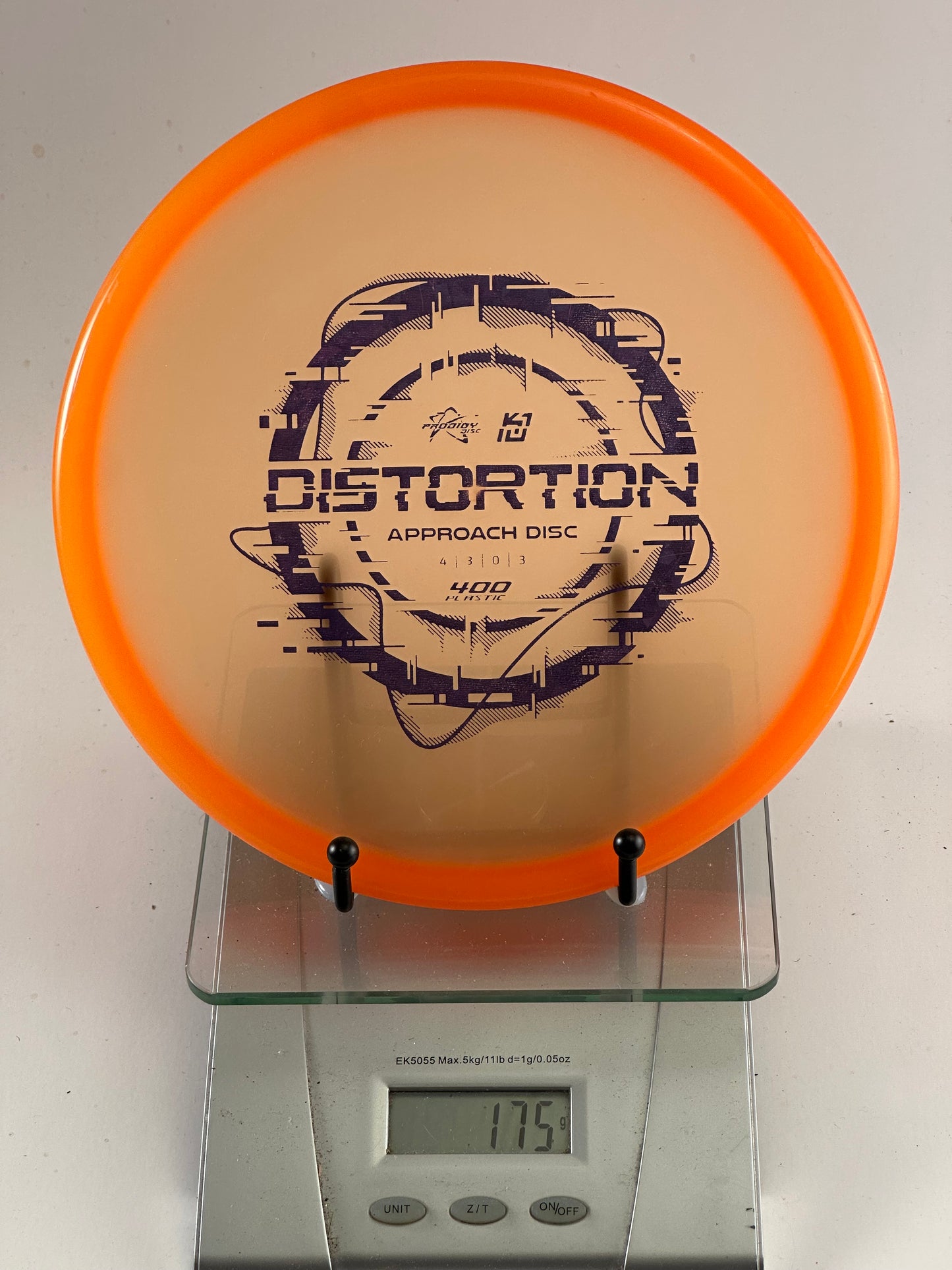 Prodigy Distortion – 400 Plastic Approach Disc (Translucent Orange Rim)