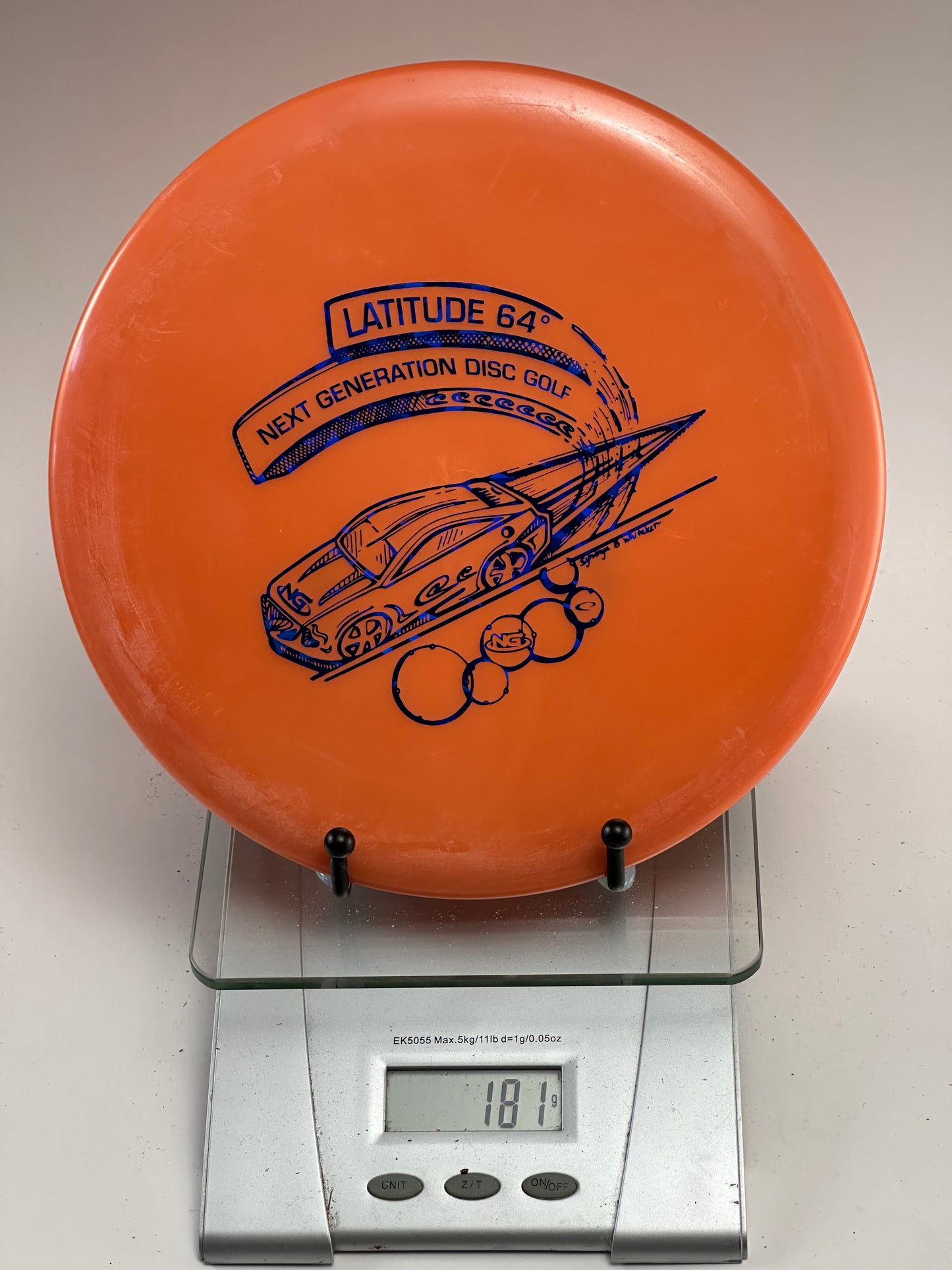 Latitude 64 Anchor Midrange – Orange – Next Generation Disc Golf Stamp
