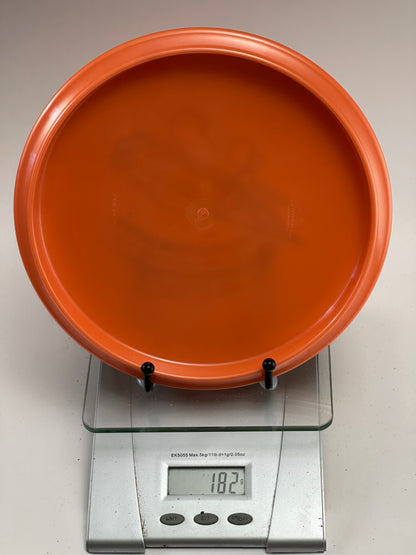 Latitude 64 Anchor Midrange – Orange – Next Generation Disc Golf Stamp