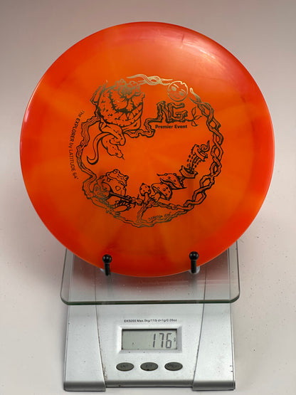 Trilogy Opto Explorer – Transparent Swirly Orange, Premier Event Stamp (176g)