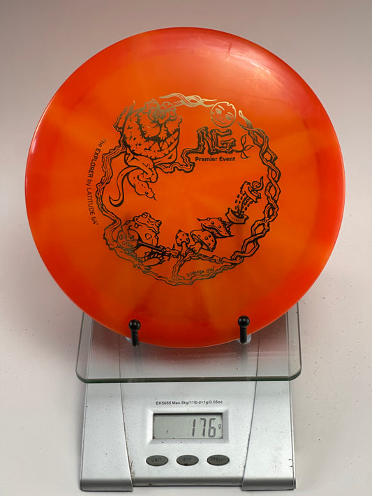 Trilogy Opto Explorer – Transparent Swirly Orange, Premier Event Stamp (176g)