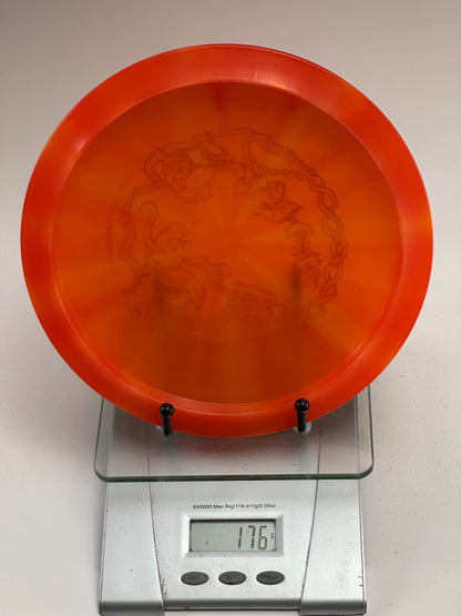 Trilogy Opto Explorer – Transparent Swirly Orange, Premier Event Stamp (176g)