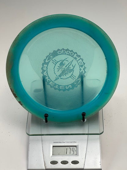 Trilogy Raketen Opto Hex Overmold Disc Golf Disc – Teal, Pink Stamp (173g)