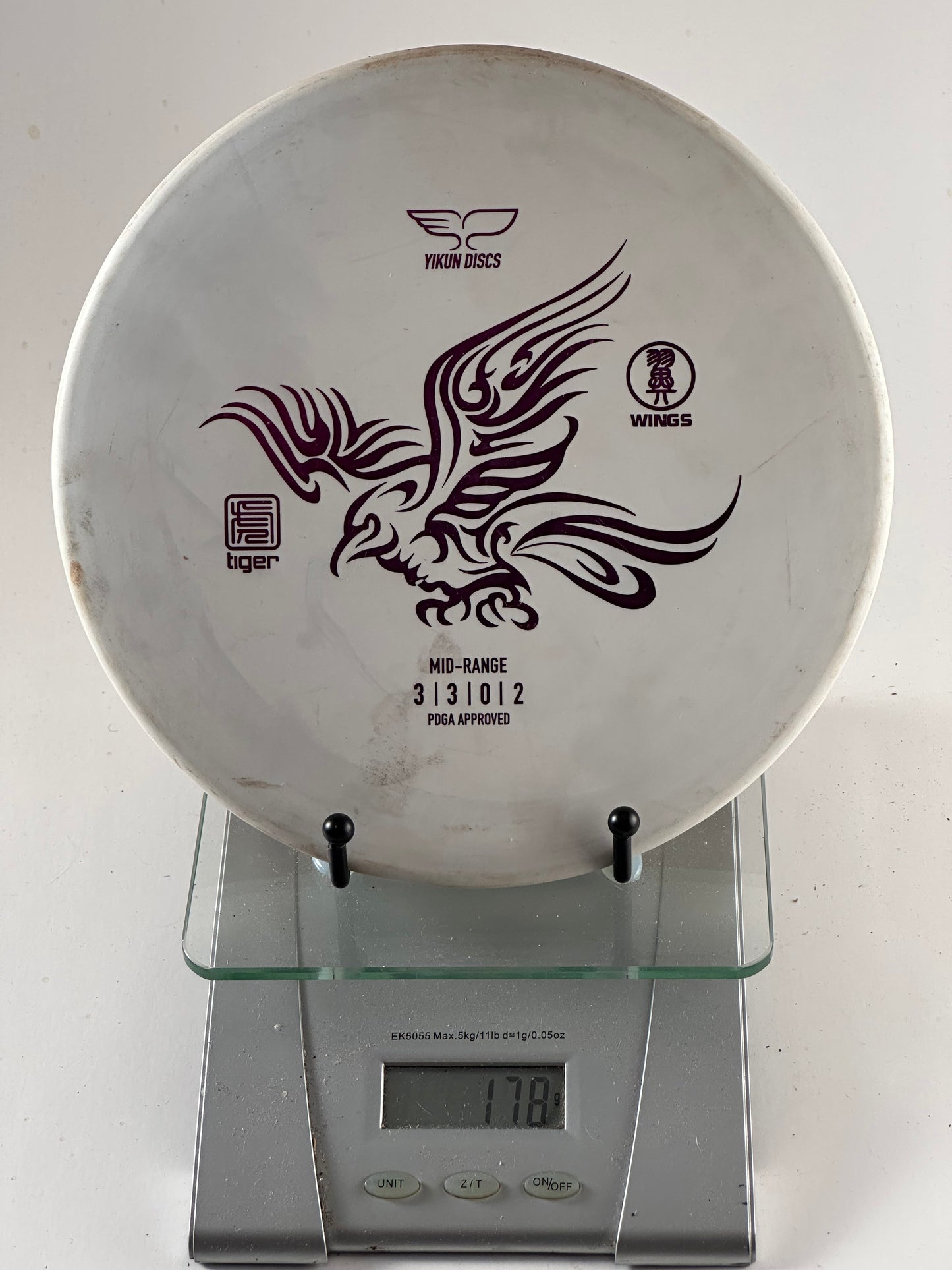 Yikun Wings Midrange (Tiger plastic) 178g White w/ Purple Stamp 3/3/0/2